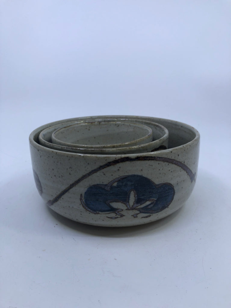 3 GREY POTTERY W FLORAL NESTING BOWLS.