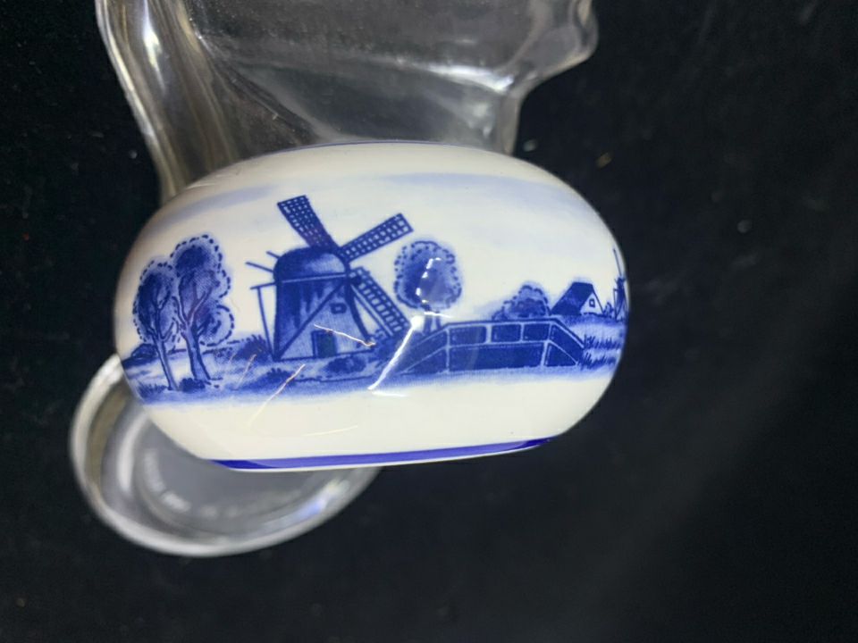 2 ROUND BLUE/WHITE WINDMILL TEA LIGHT HOLDERS.