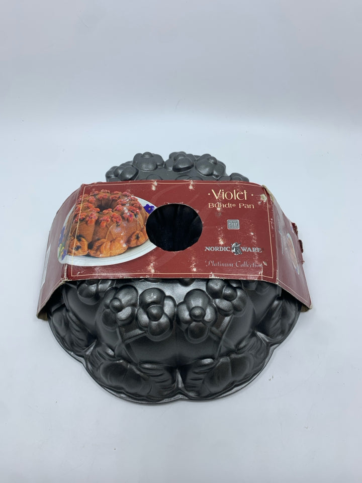 NORDIC WARE VIOLET BUNDT PAN.