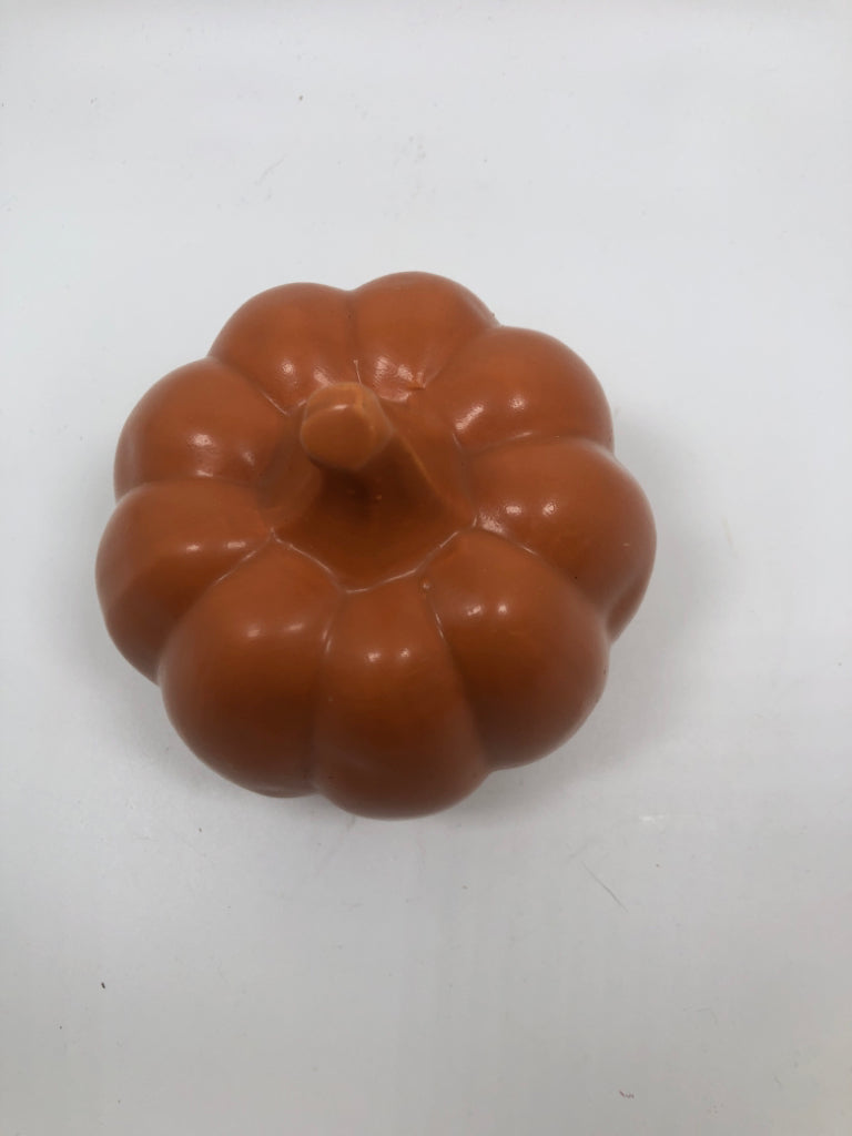 ORANGE CERAMIC PUMPKIN FIGURINE.