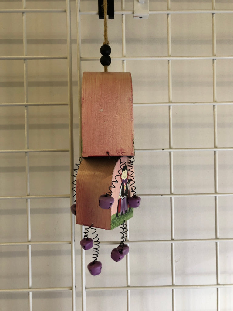 METAL PAINTED DRACULA BELL WALL HANGING.