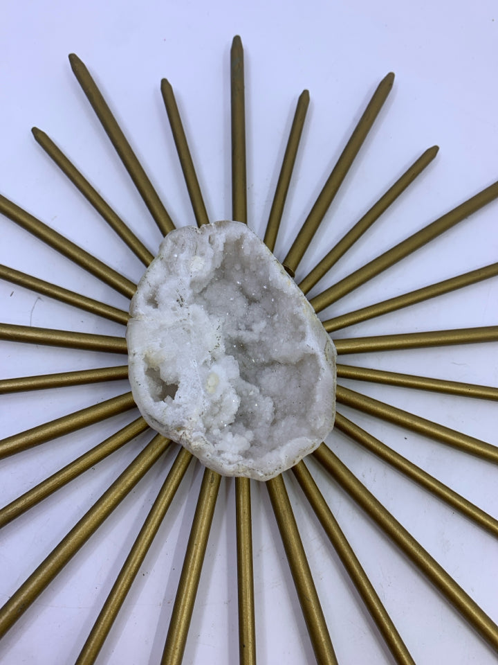 SMALL BRASS STARBURST W/ WHITE QUARTZ ROCK.