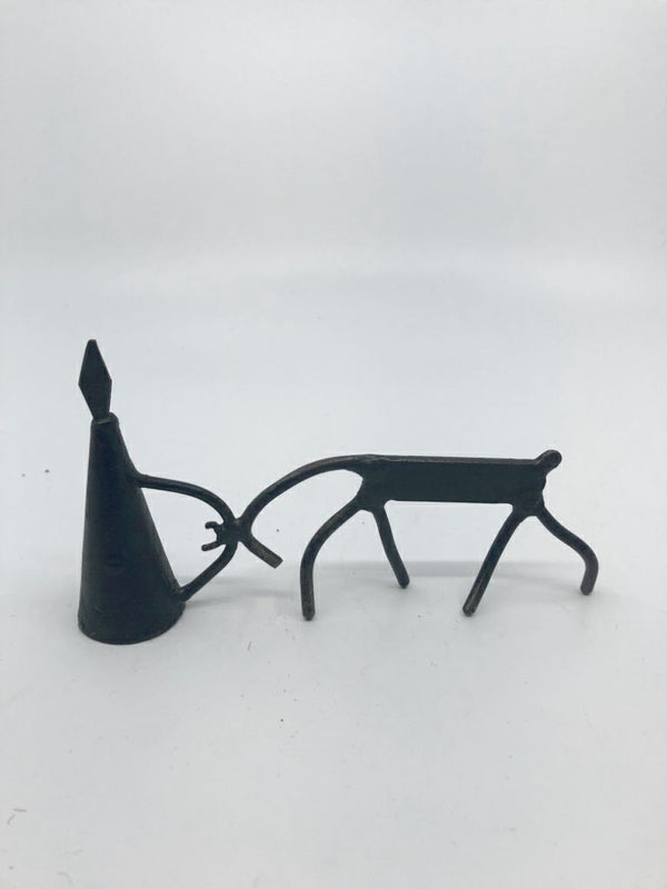 ABSTRACT REINDEER CANDLE SNUFFER.