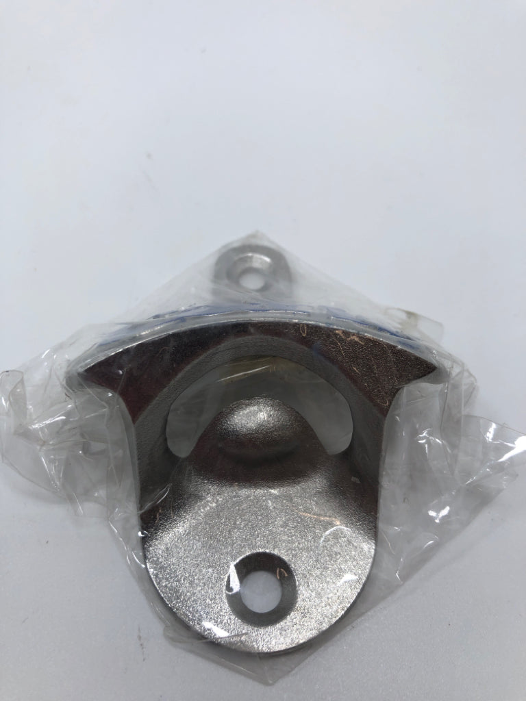 NIP CARIB BREWERY BOTTLE OPENER.