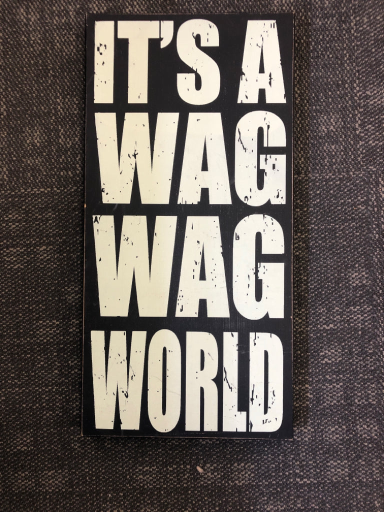 ITS A WAG WORLD WOOD BLOCK SIGN.
