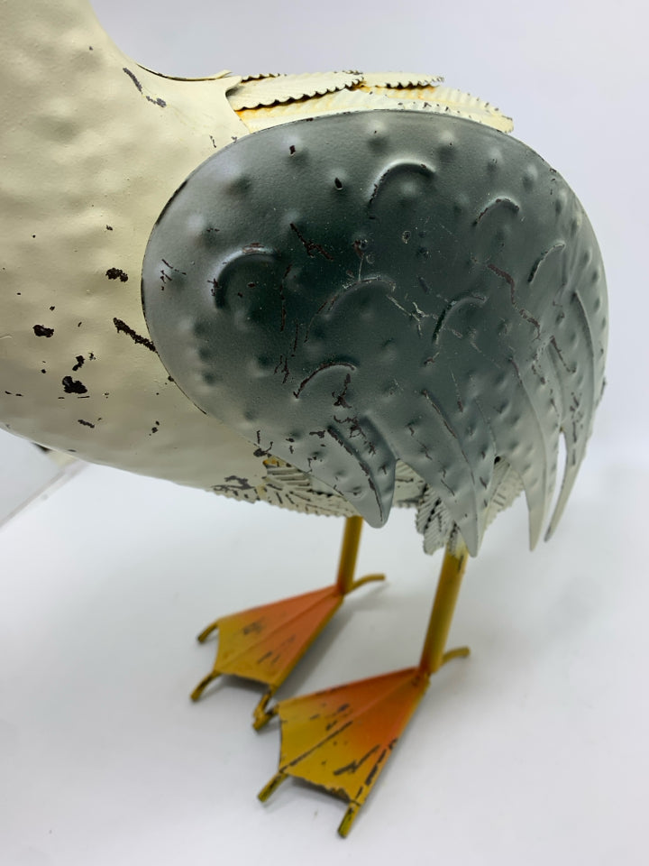 WELDED PELICAN SCULPTURE W/MOUTH OPEN.