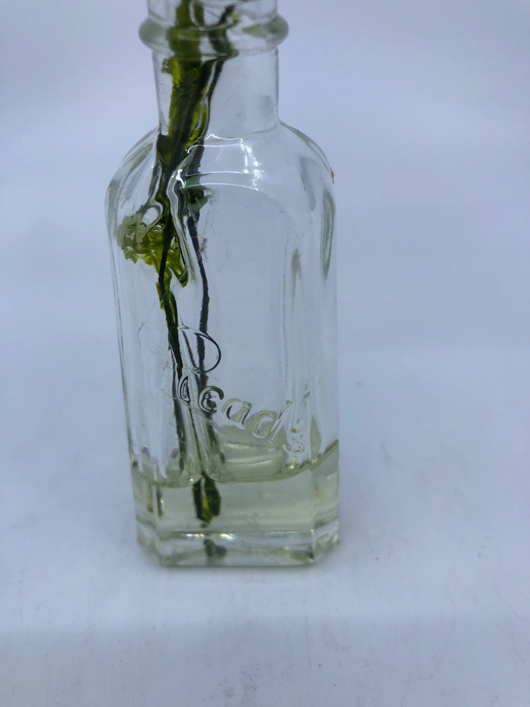 FAUX YELLOW FLOWER IN GLASS VASE.