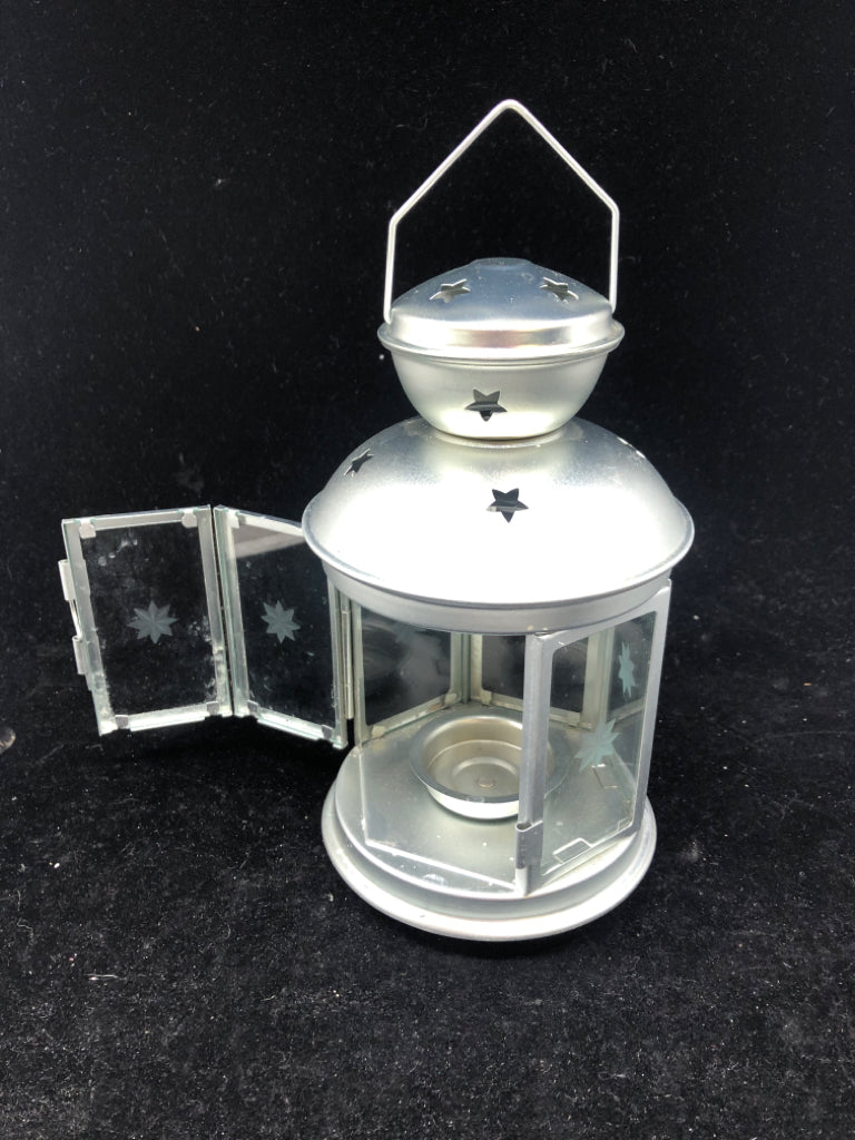 SILVER LANTERN STAR CUTOUT CANDLE HOLDER.