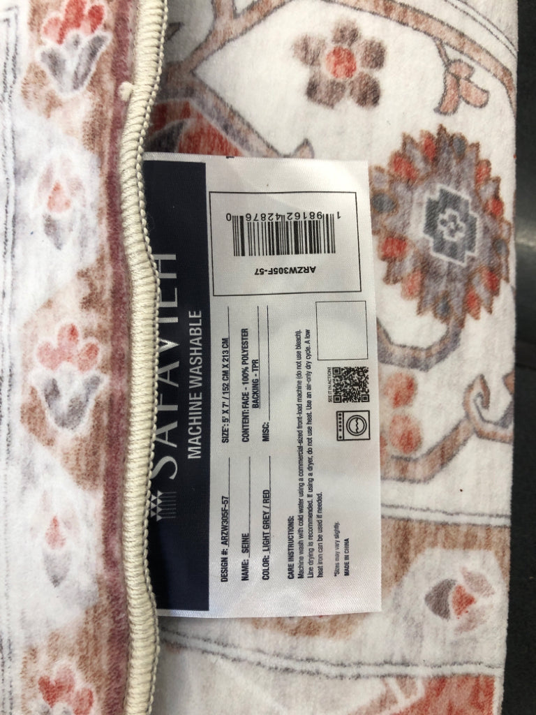WASHABLE SALMON ORIENTAL PRINTED RUG.