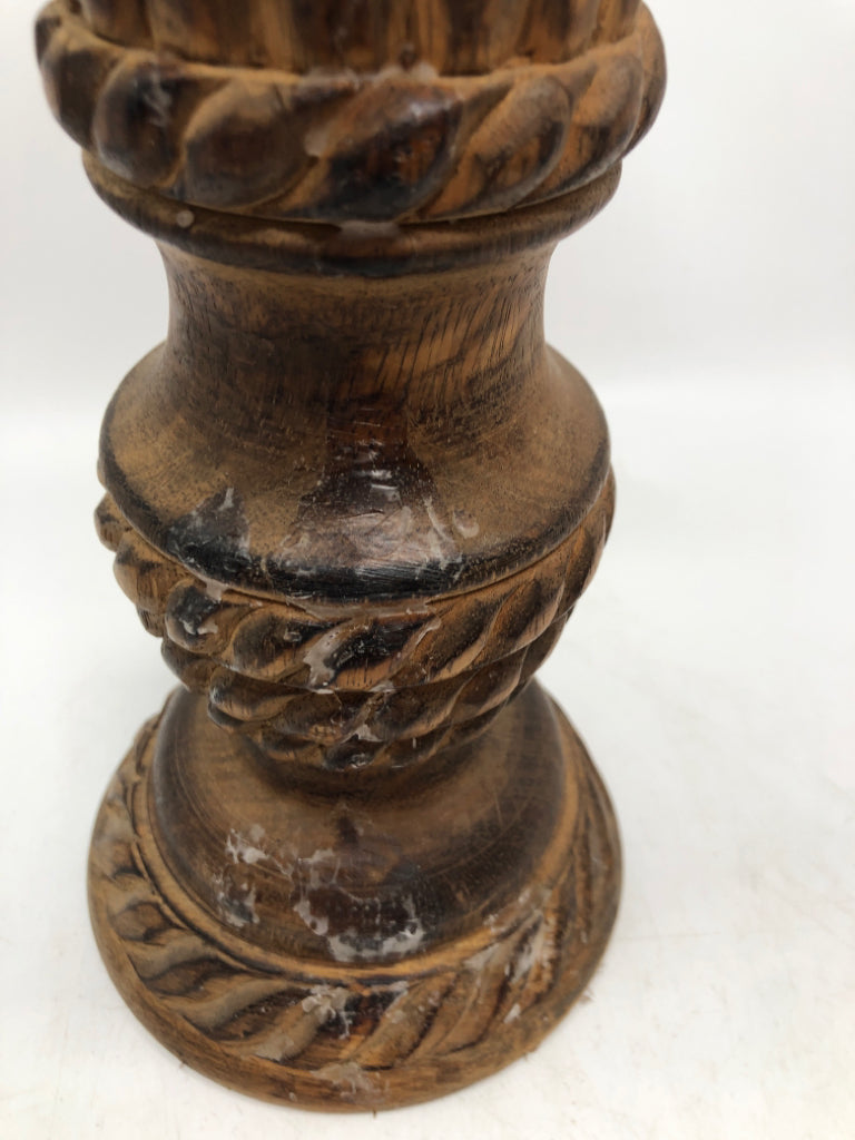 2 WOOD CARVED CANDLE HOLDERS W/BURNT FINISH.