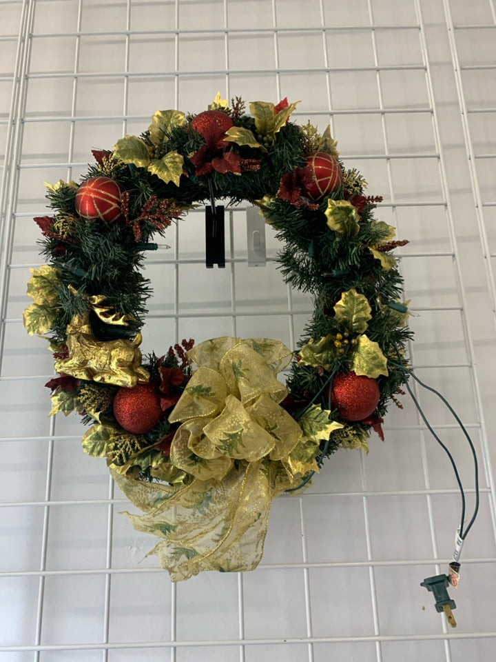 LIGHTED GOLD AND RED WREATH.