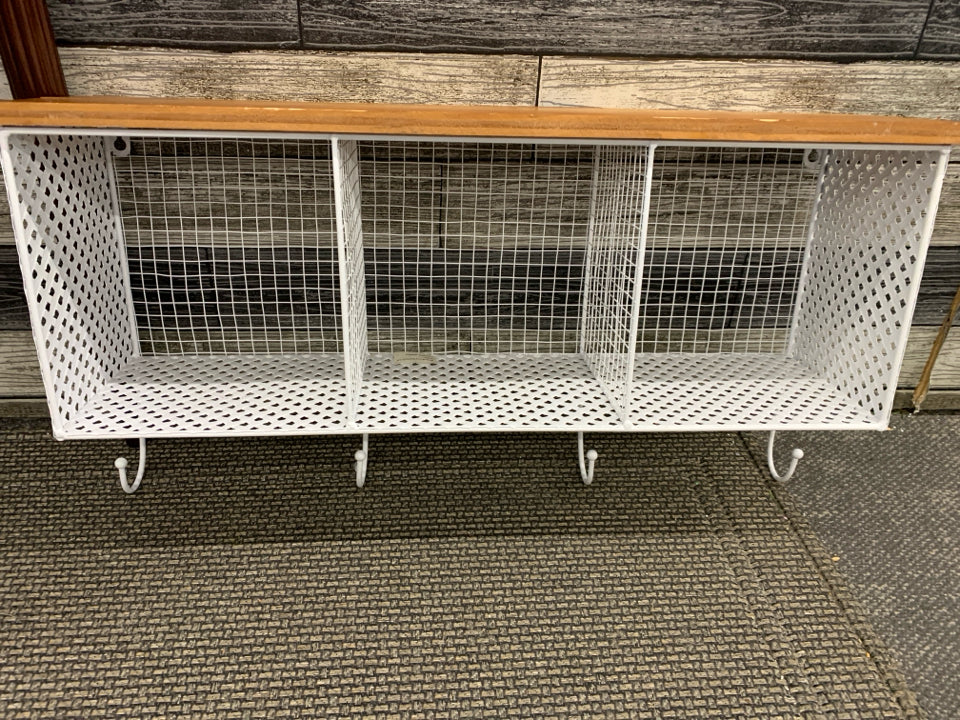 WHITE MESH WALL HANGING W 4 HOOKS AND CUBBIES.