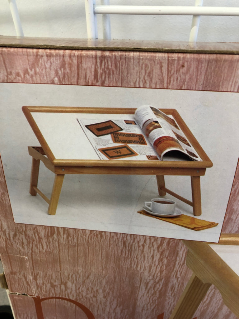 ADJUSTABLE TILT TOP BED TRAY.