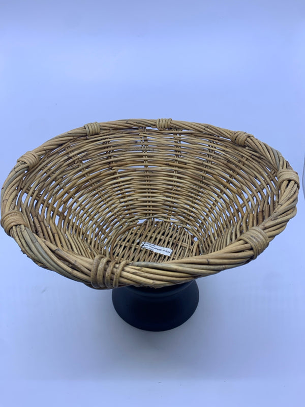 BLACK FOOTED WICKER WOVEN FRUIT BASKET.