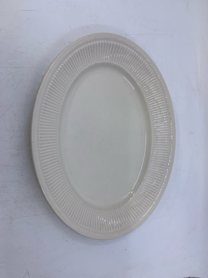 OVAL PLATTER W/ RIBBED EDGE.