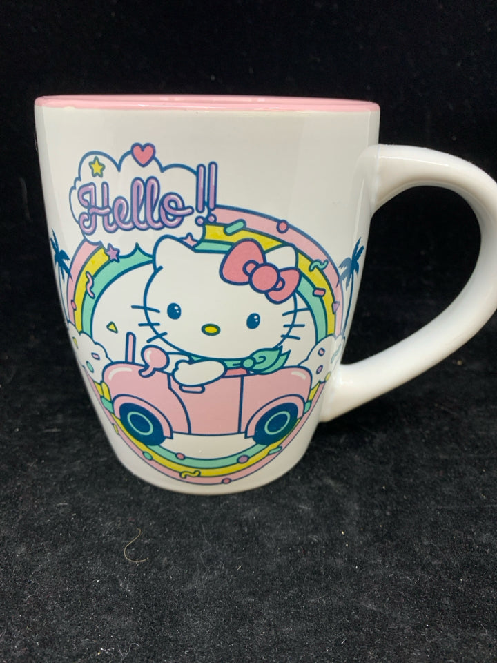 PINK, WHITE HELLO KITTY IN CAR MUG.