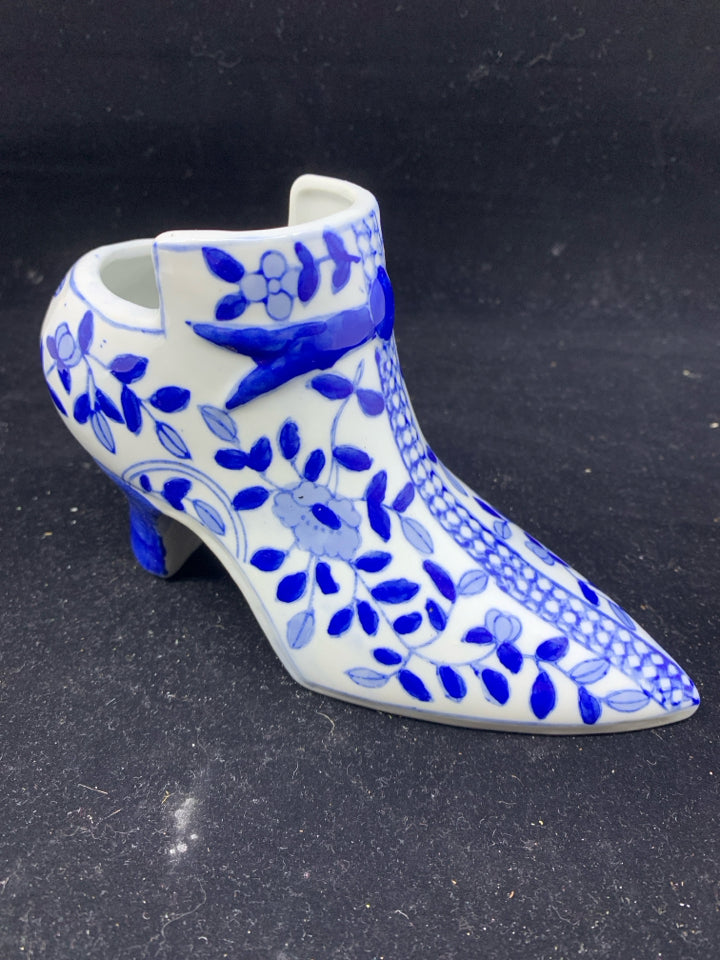 BLUE AND WHITE SHOE PLANTER.