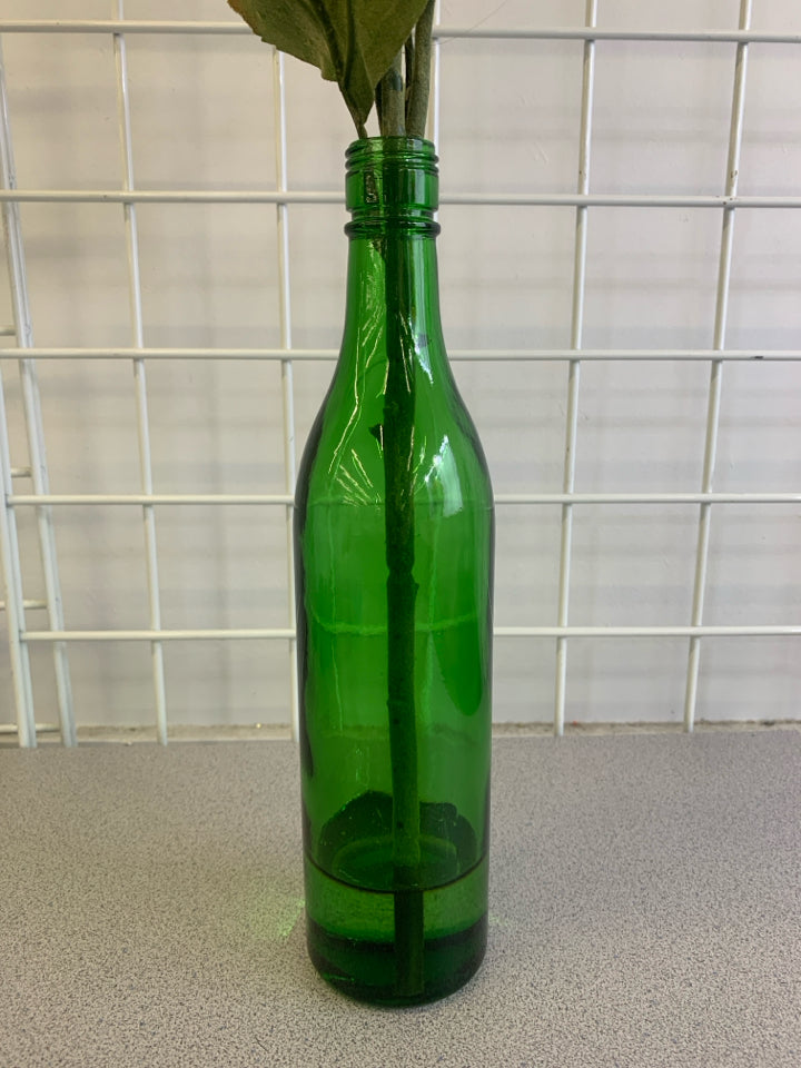 GREEN GLASS VASE W/ FAUX SUNFLOWERS.
