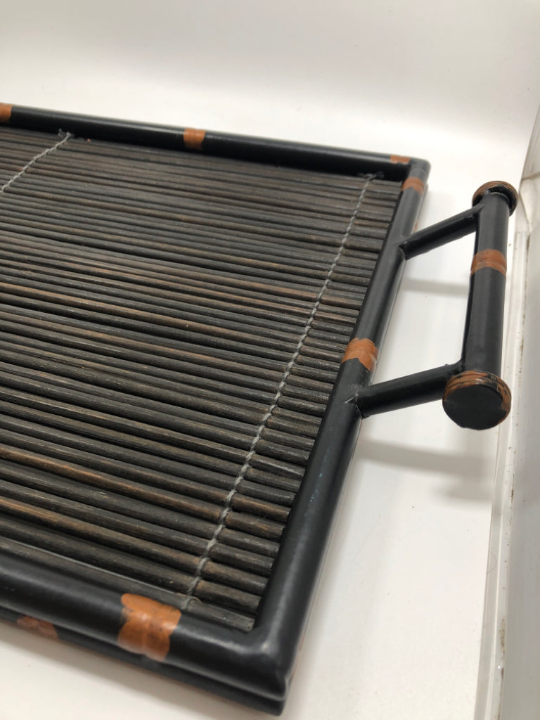 BLACK WICKER TRAY W/METAL RIM AND HANDLES.