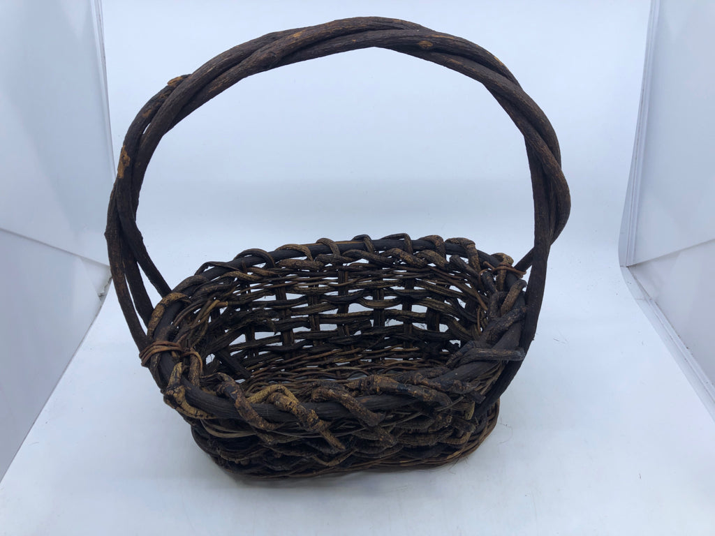 DARK STURDY STICK BASKET BURNT LOOK.