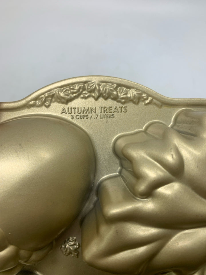 NORDIC WARE CAST ALUMINUM AUTUMN TREATS CAKELET PAN GOLD.