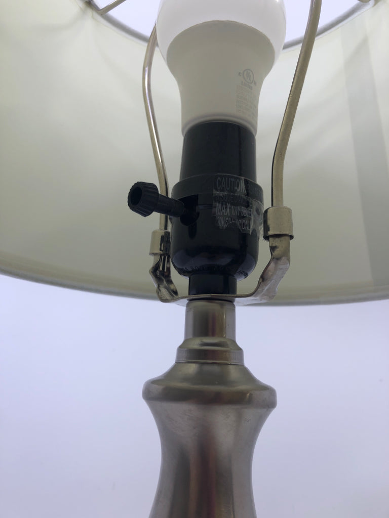 SILVER BASE LAMP W/ WHITE SHADE.