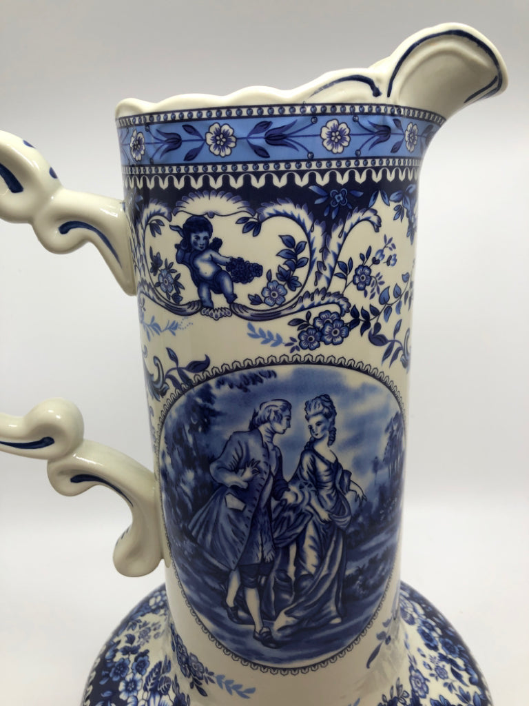 VTG BLUE/WHITE TALL DETAILED PITCHER.