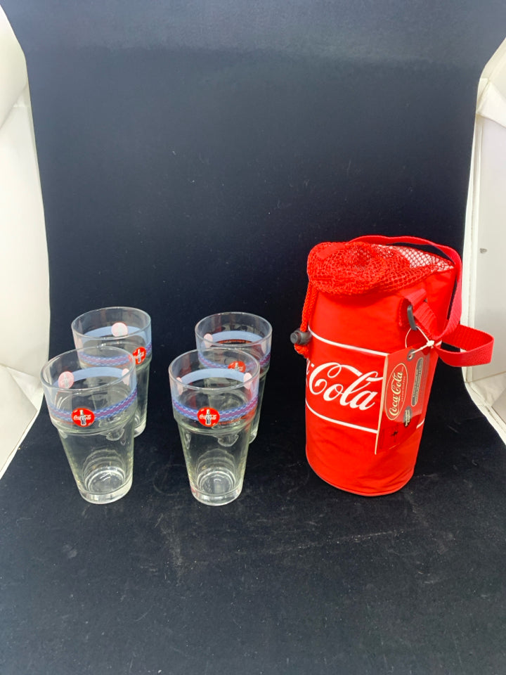 4 COCA-COLA THEMED STACKABLE GLASSES IN CARRYING SLEEVE.
