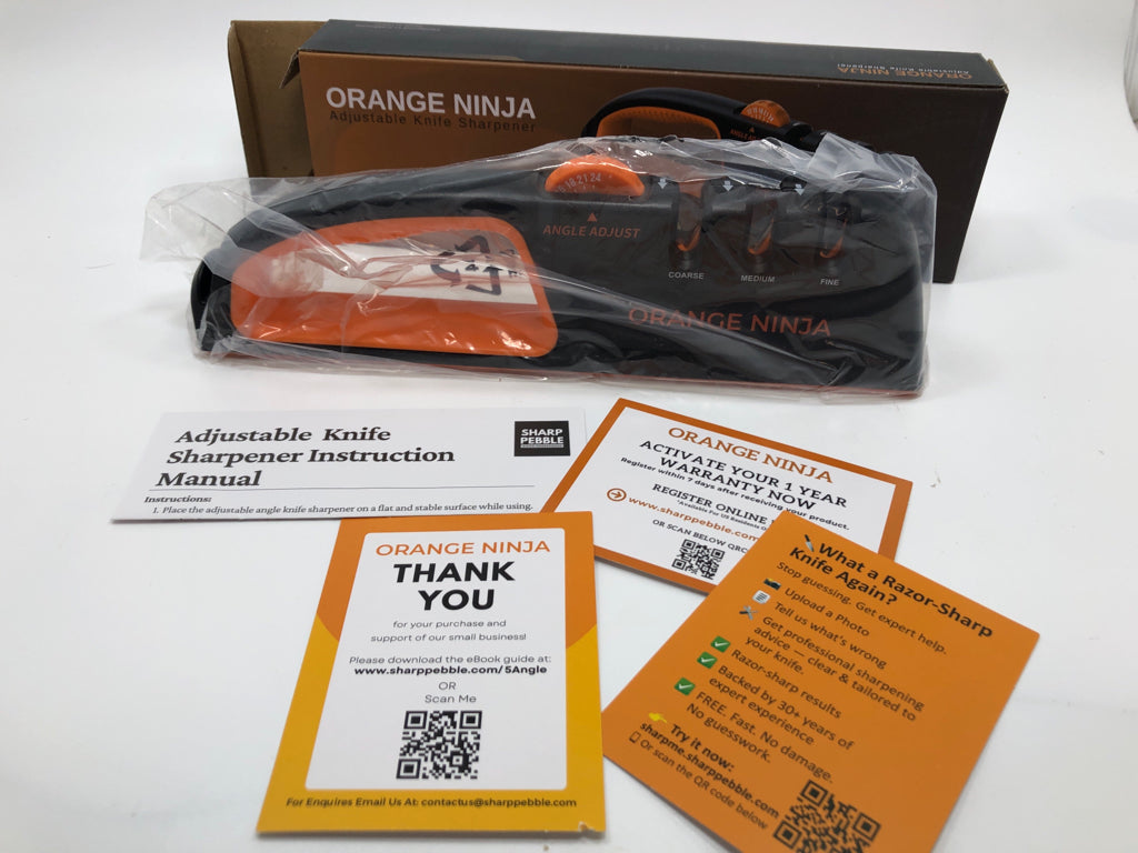 NIB ORANGE NINJA KNIFE SHARPENER.
