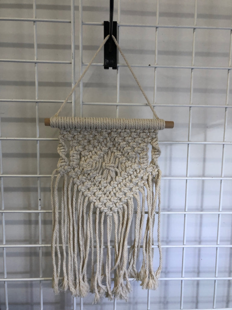 WHITE MACRAME WALL HANGING.
