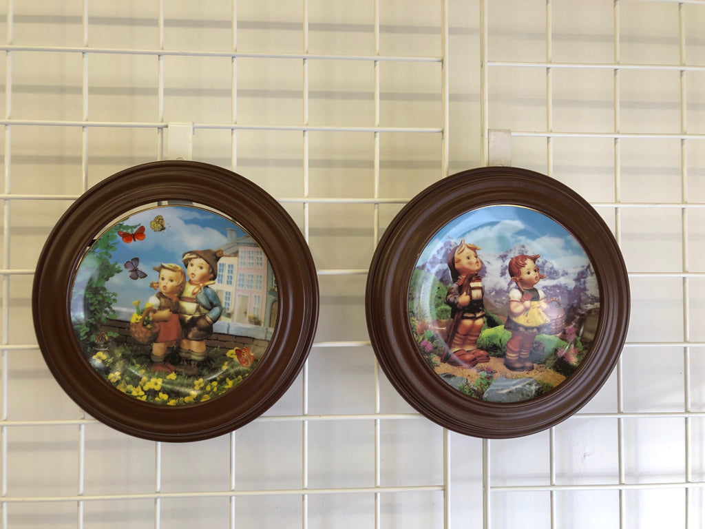 2 HUMMEL PLATES IN WOOD FRAME.