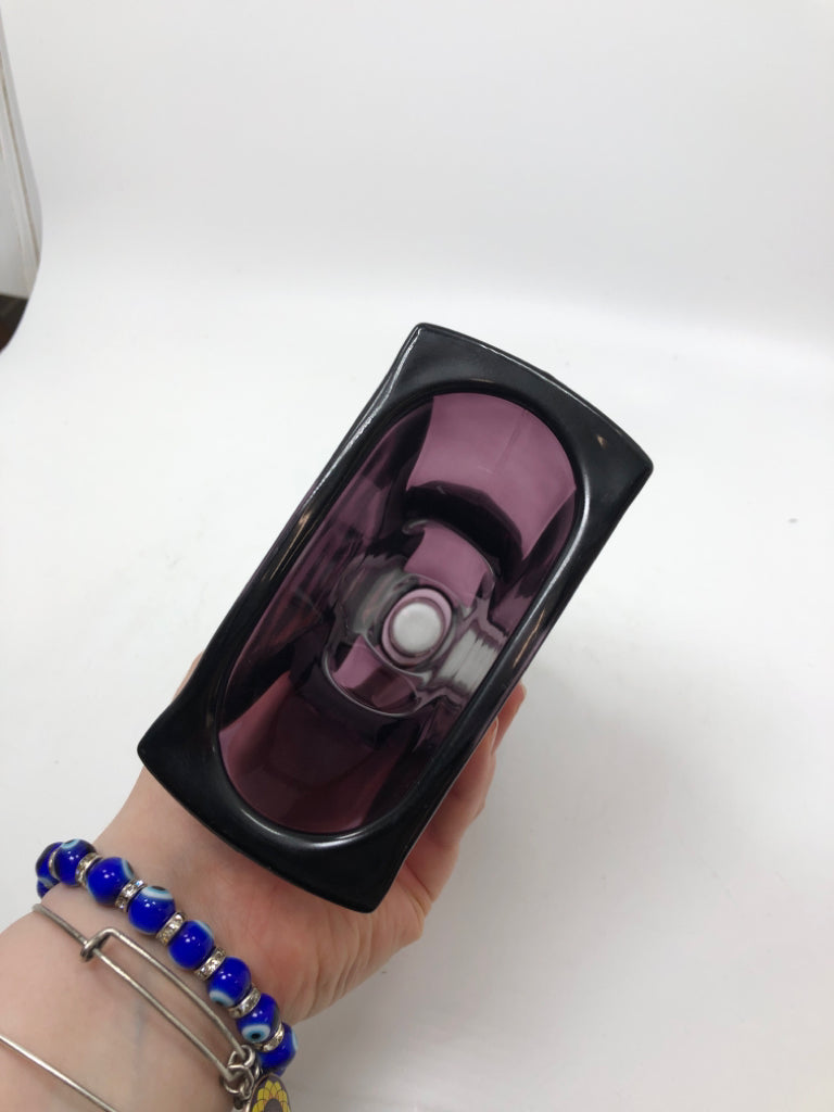 WAVY PURPLE GLASS CANDLE STICK HOLDER.