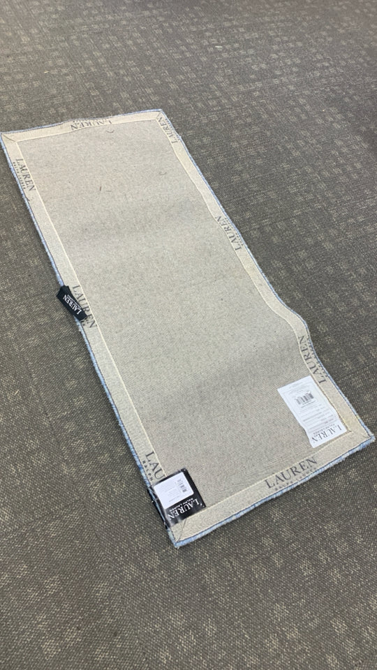 NEW IVORY NAVY FLORAL ACCENT RUG.