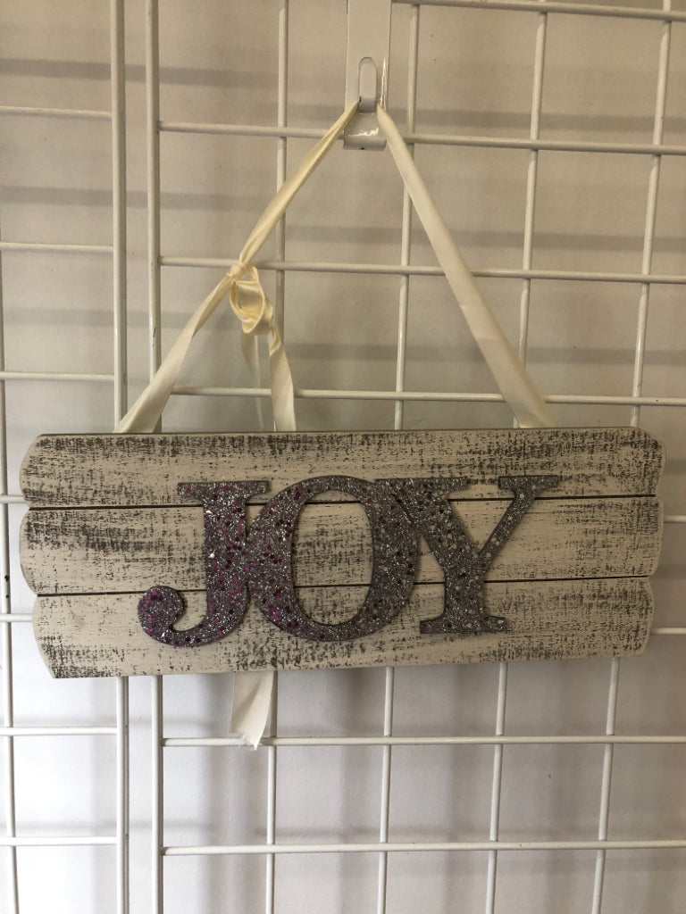 SILVER SPARKLE JOY WALL ART W/ FAUX WHITE WOOD BACKGROUND.