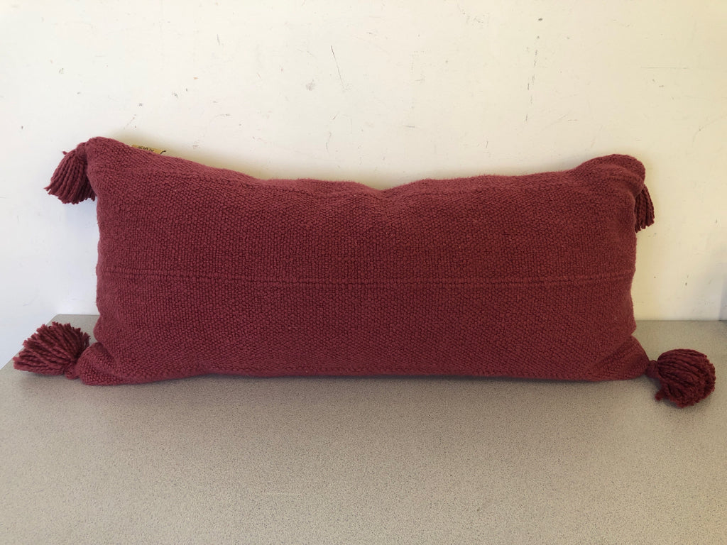 MAROON RECTANGLE PILLOW W TASSELS.