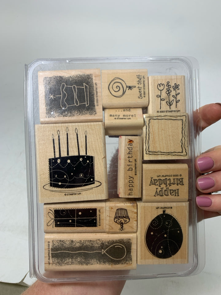 STAMPS IN CASE.