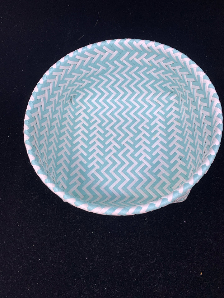 TEAL AND WHITE WOVEN BASKET.