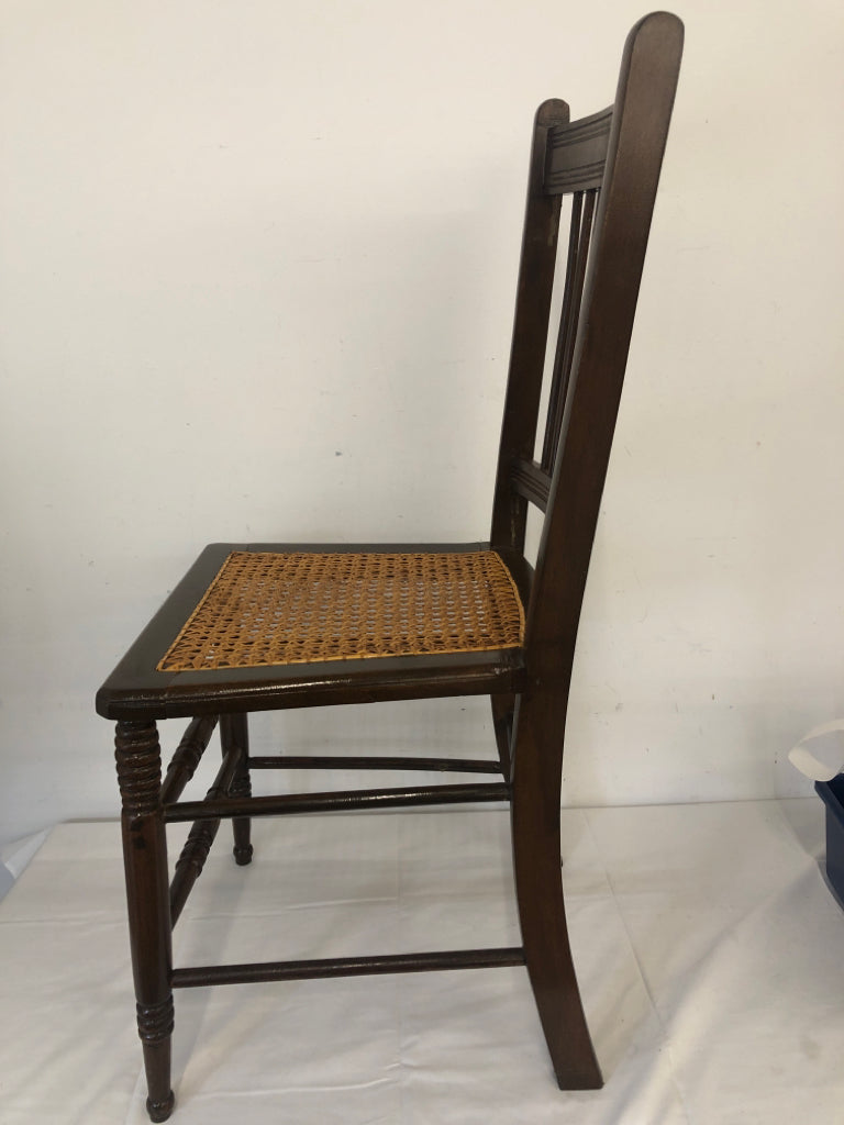 VTG DARK WOOD ACCENT CHAIR W TAN SEAT.