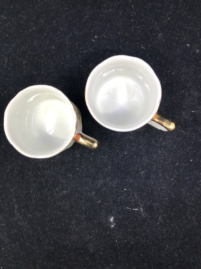 2 VTG SMALL TEA CUPS W/VICTORIAN COUPLE.