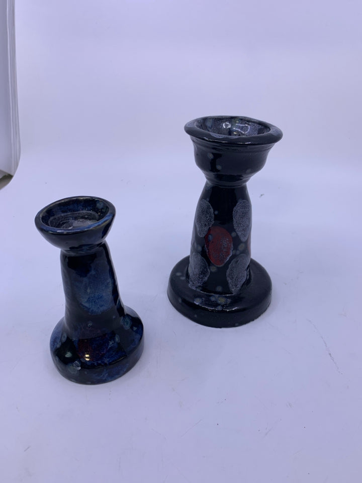 2PC POTTERY CANDLE HOLDER SET.