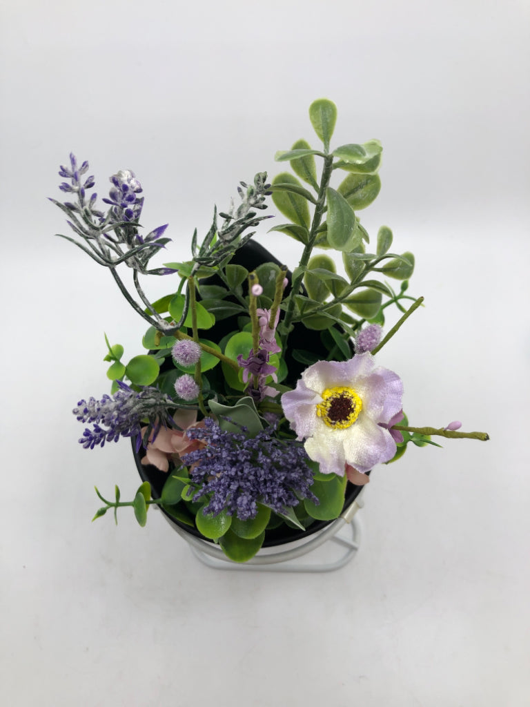 FAUX FLORALS IN STANDING PLANTER.