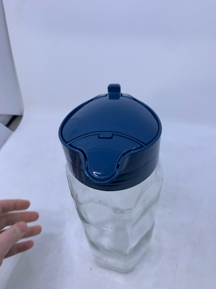 GLASS PITCHER W/ BLUE PLASTIC HANDLE/LID.
