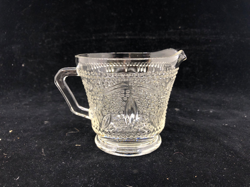 SMALL CLEAR GLASS HOBBNAILED CREAMER.