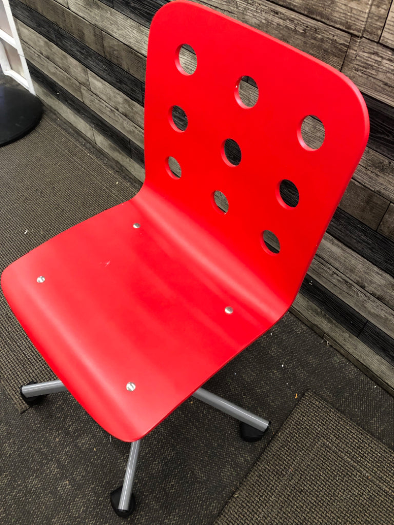 RED DESK CHAIR W WHEELS.