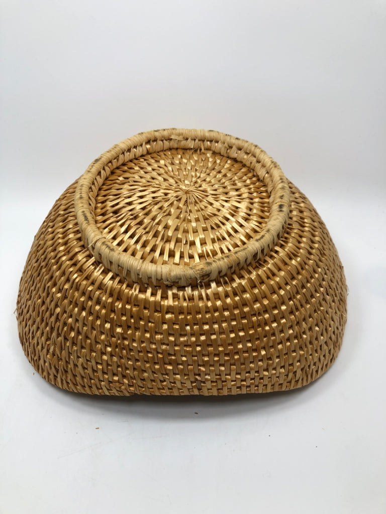 TIGHT WOVEN BASKET.