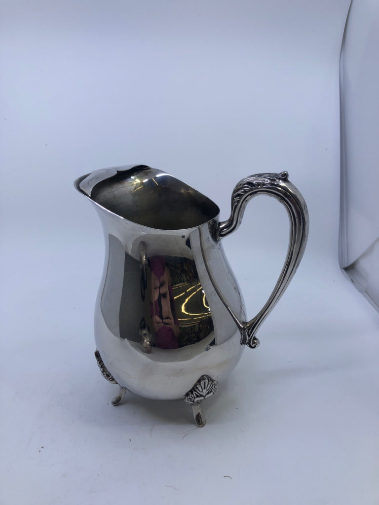 VTG SILVER FOOTED PITCHER W ICE LIP.