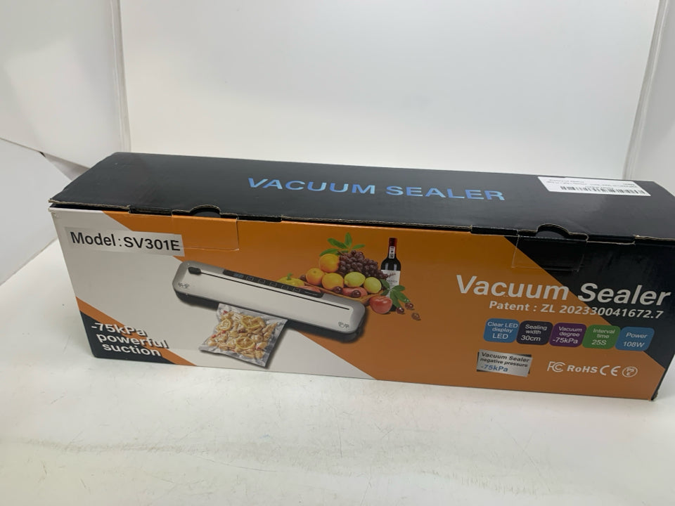 NIB VACUUM SEALER MACHINE.