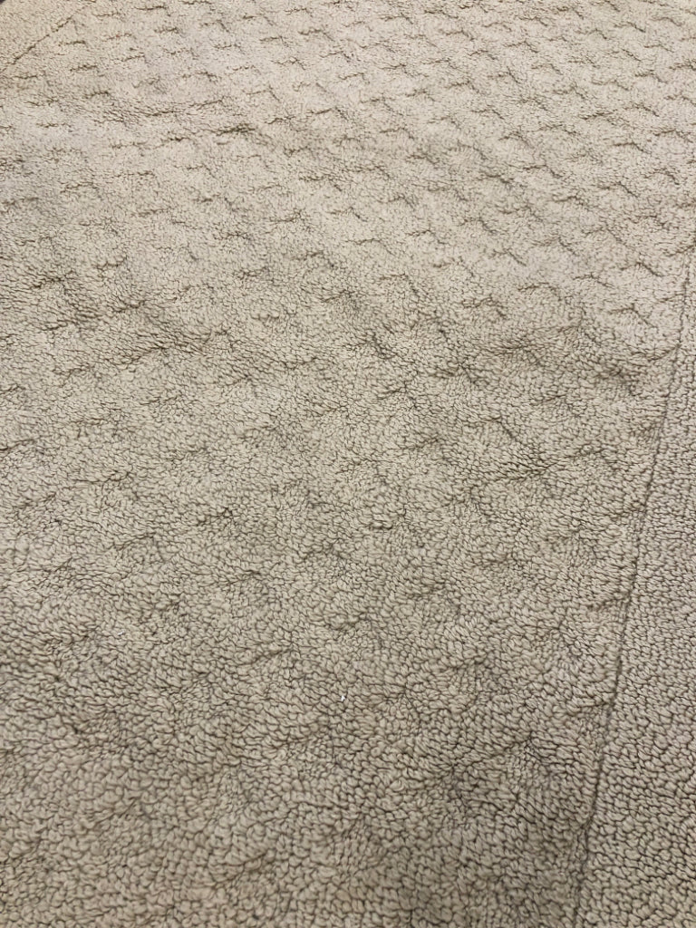 TAN RUG.
