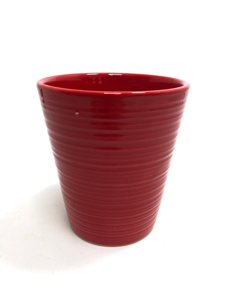 RED CERAMIC PLANTER.