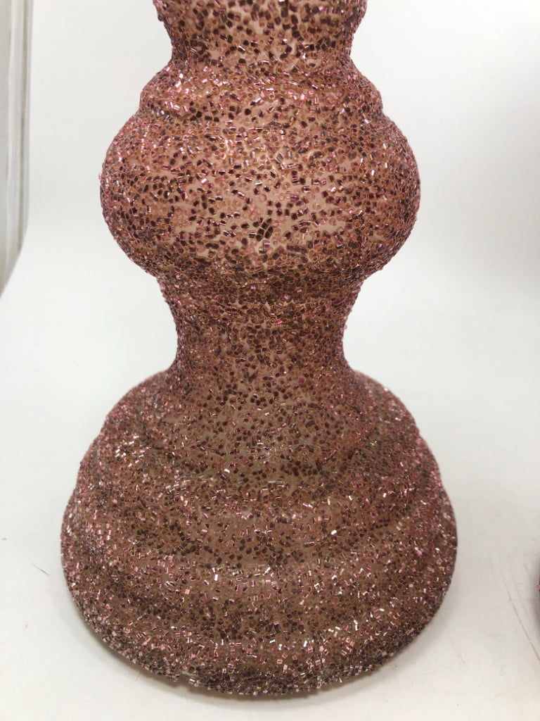 2 PINK GLITTER PILLAR CANDLE HOLDERS.